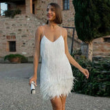 VESTIDO MINI CON PLUMAS ELEGANTE