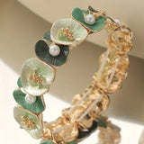 Pulsera Vintage con Flores Verdes y Margaritas