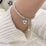 Pulsera elegante con corazón de plata