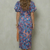 VESTIDO MIDI CON ESTAMPADO ABSTRACTO Y MANGAS ABULLONADAS